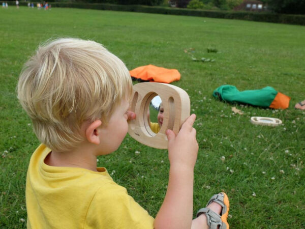 Miroir déformant avec poignées